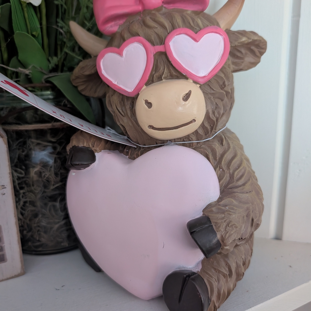 Bella Luxx Brown and Pink Heart-Holding Cow Decor Highland Cow